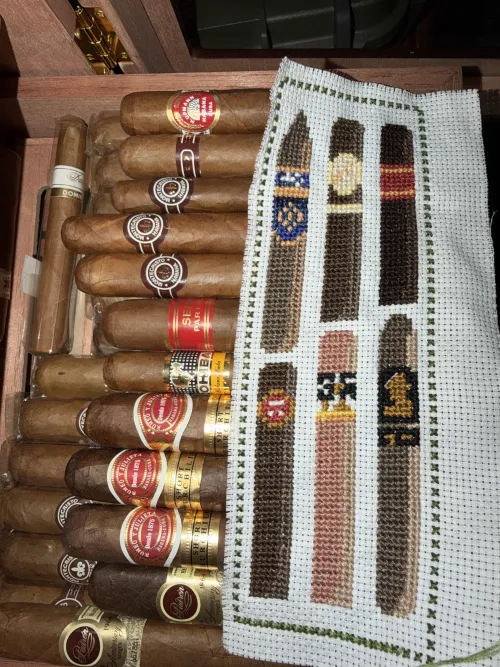 My wife has been joining me for cigars more. She made me this lovely bookmark today, and we are both wondering what brand the cigar with the blue band is? (patterns are from etsy)