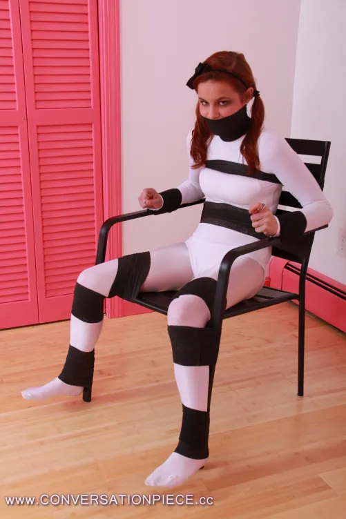 Noone told her she would be stuck to the chair for so long. She thought she'd fight for 10 minutes or so and then she'd be released. Instead, she's trapped for some days now. Not long enough, according to her owner and judging by her face.