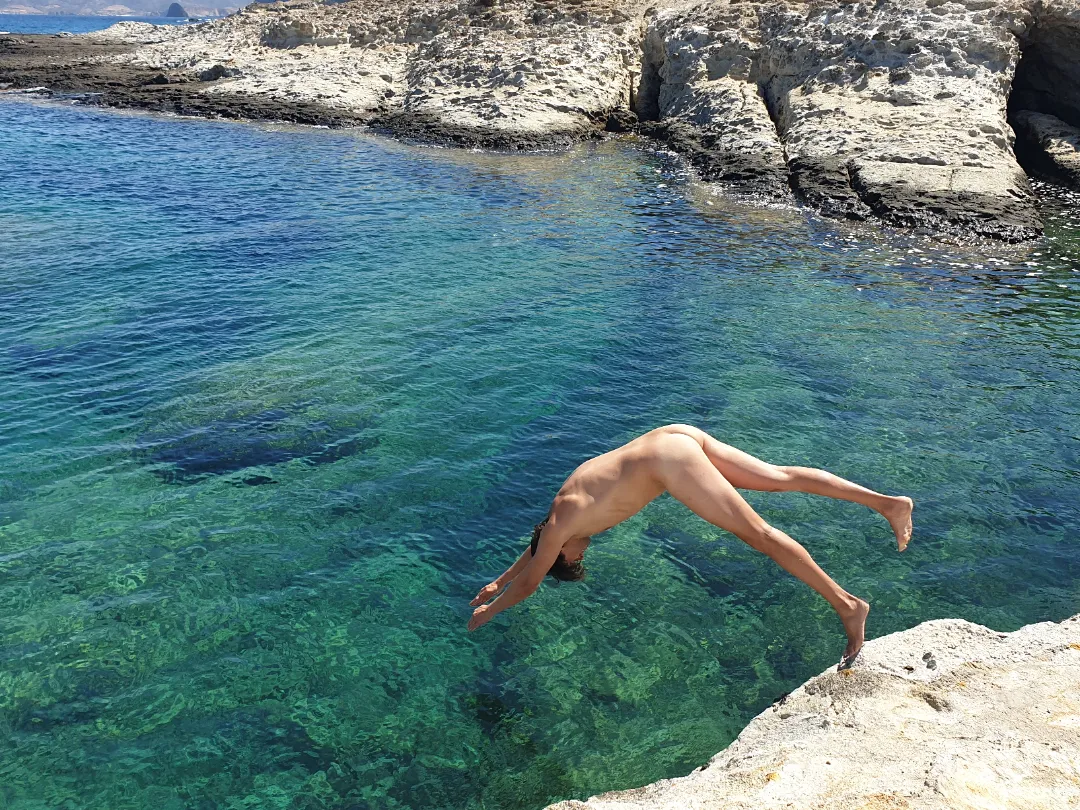 Nude beach swimming in Greece