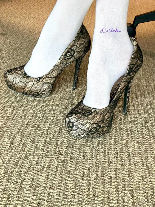 Platforms, stockings, and an arch pop