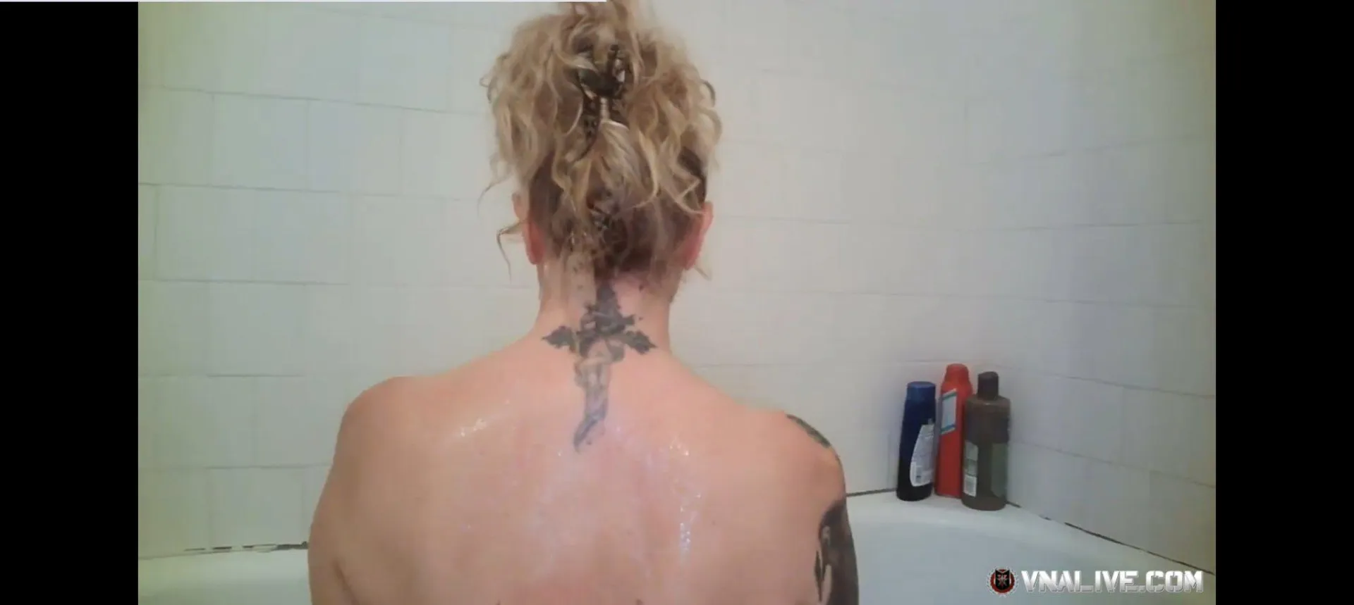 Rare View Of Her Neck Tattoo