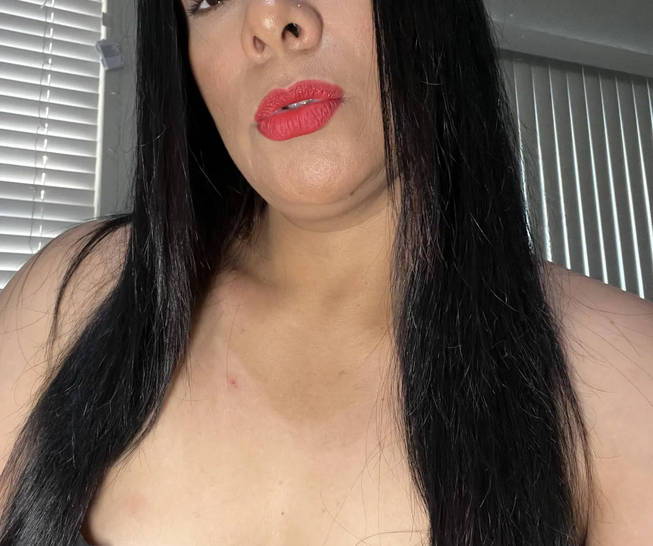 “Red lips, dangerous intentions.”