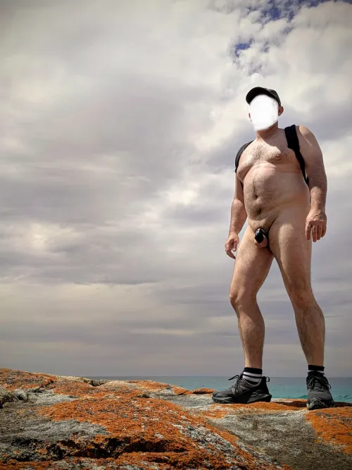 Red rocks and blue balls - chastity hike over the headland