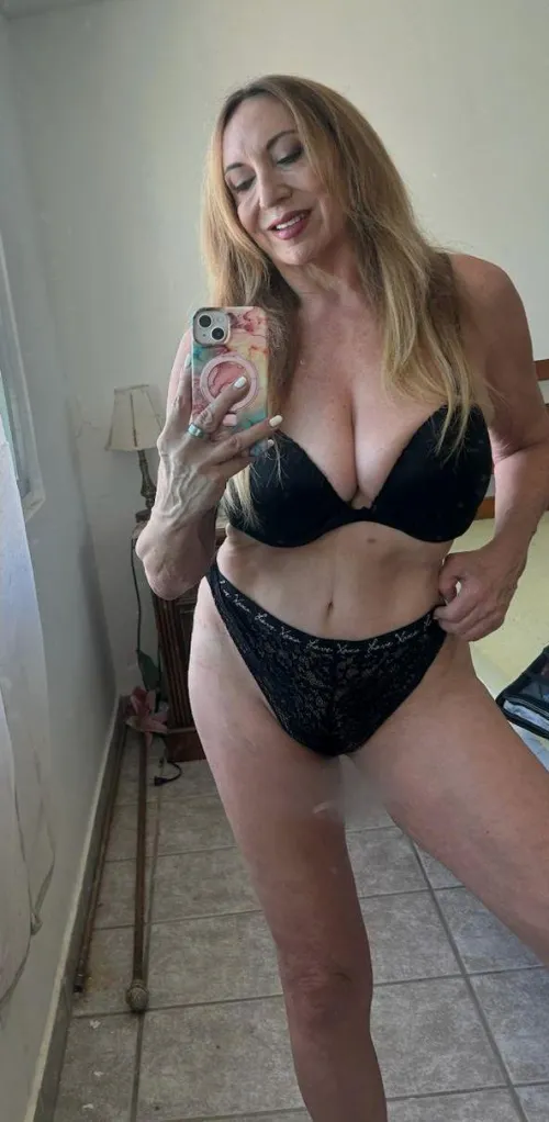 saggy tits on a 61 years old granny..