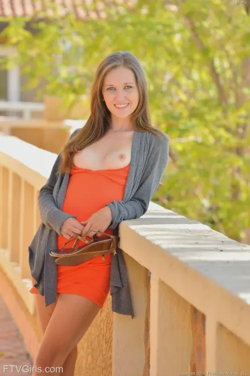 Scenes from AltBoobWorld : This lady has removed her shoes to take part in the latest activity  - grounding yourself on a bridge.  It elevates the sense of wellness, apparently.