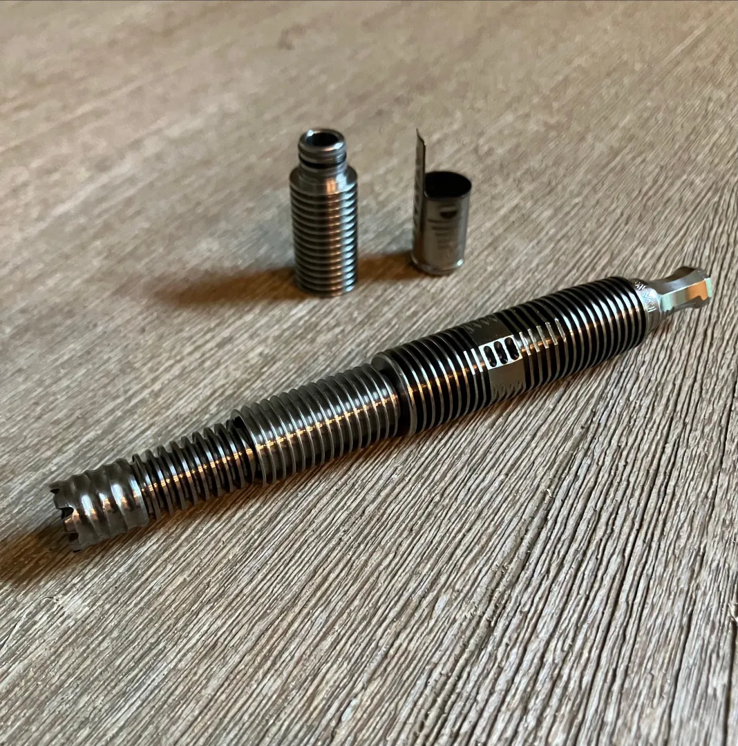 Shell shock silencer mounted on the Spinley. Fins for days