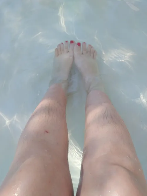 Showing off my hairy legs in the pool