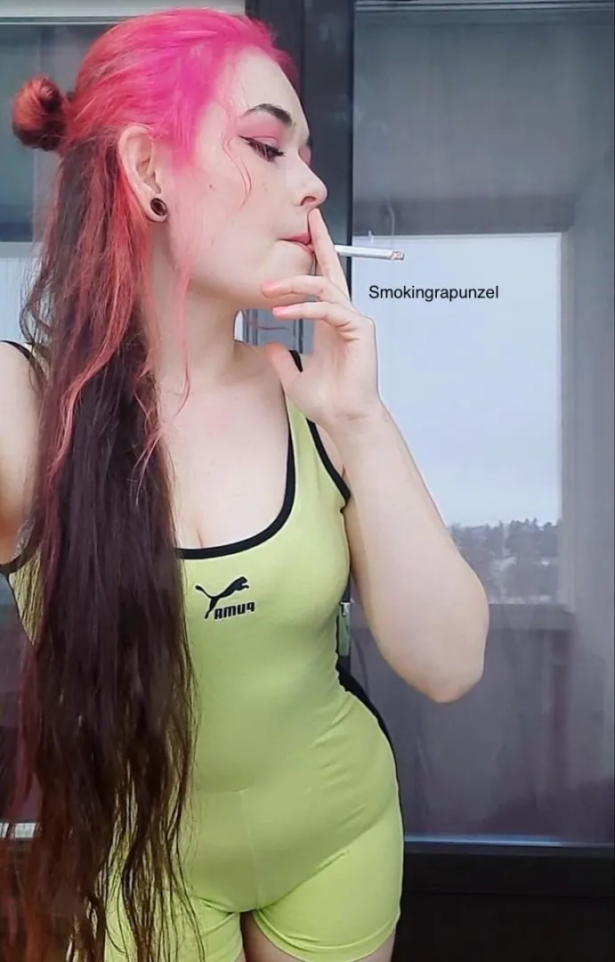 Smoking in a tight bodysuit that shows off my curves