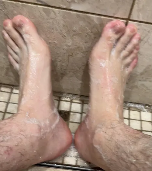 Soapy watch me wash my feet.