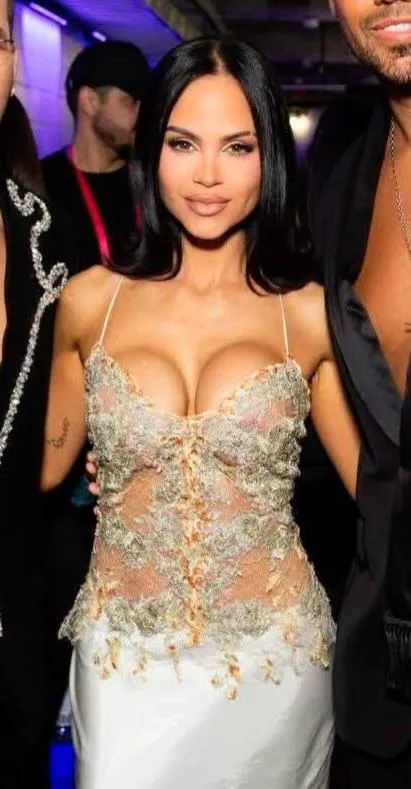 Some people say her breasts look this way due to breastfeeding...