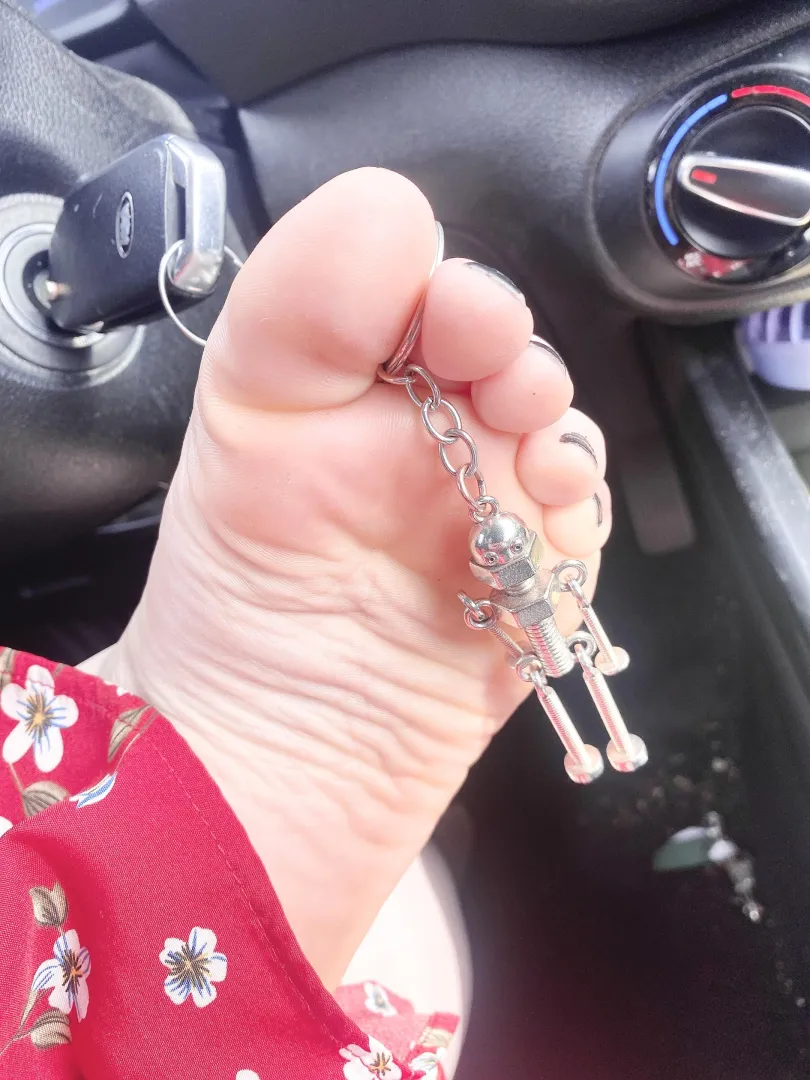 Sometimes when I’m waiting in my vehicle, I like putting my little keychain friend in between my toes and scrunch my feet so he doesn’t go away!