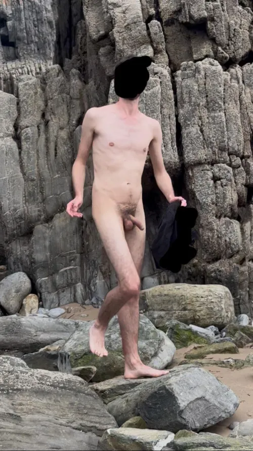 Taking off the swimshort