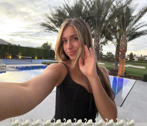 Tate McRae selfie in front of a pool IG 1/25/2026