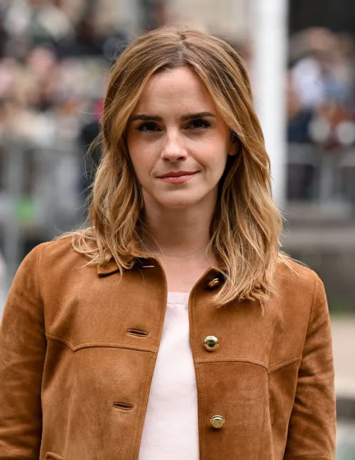 That smirk, she knows and loves it