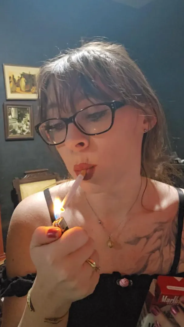 The dangle as I light up. Don't worry, the top cums off very soon.