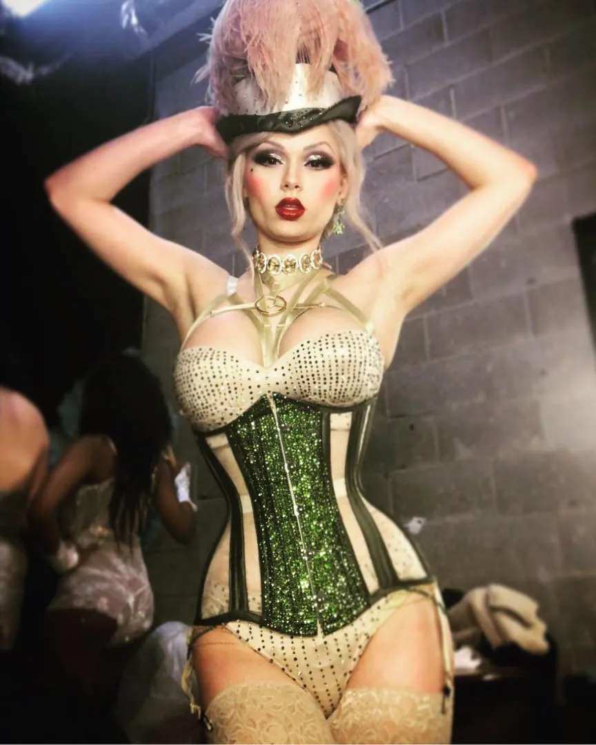 The face of someone who forgot to pee before putting her corset on