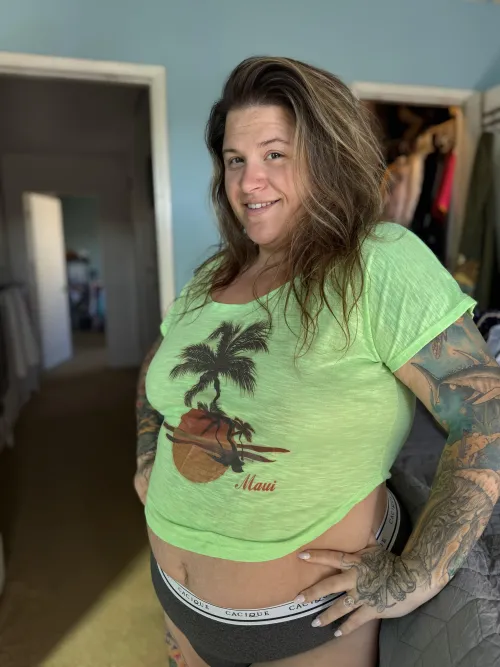 This BBW covered in tattoos can cure those Monday blues.