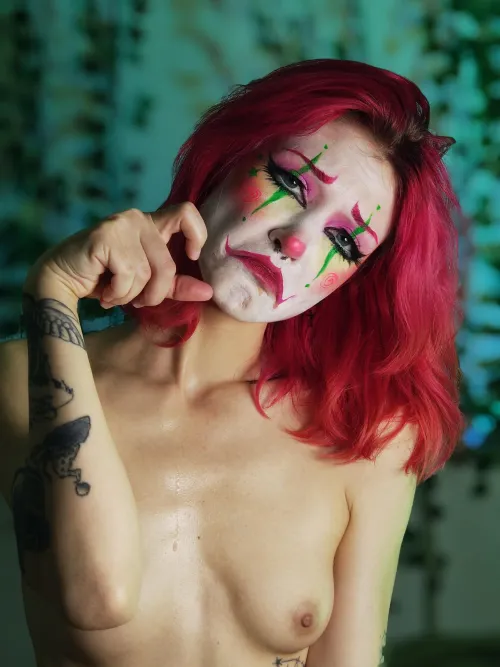 This clown isn't honking because her balloons haven't inflated