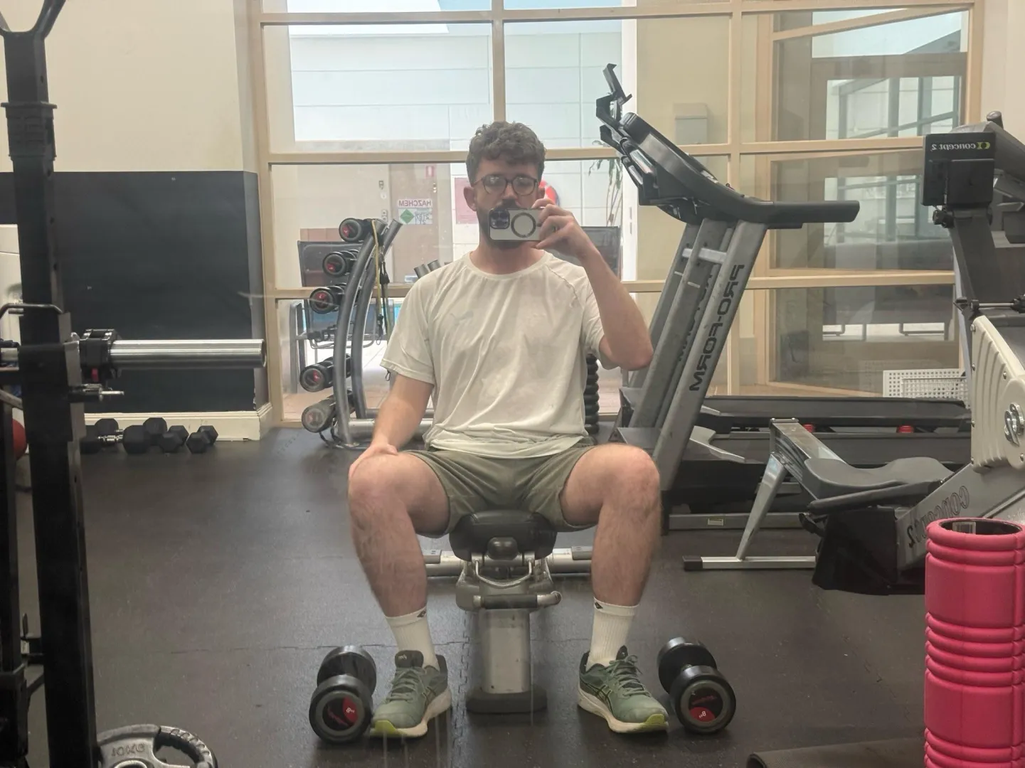 Tight shorts in empty apartment gym