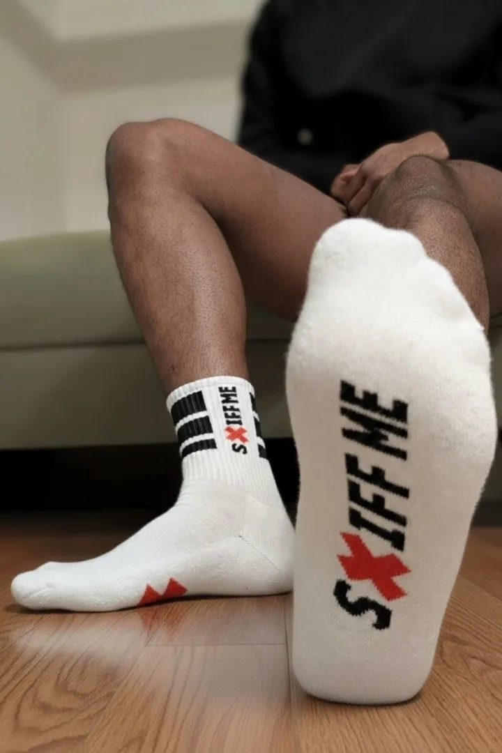 When the socks say 'sniff me,' you know that's an invitation you can't ignore! 