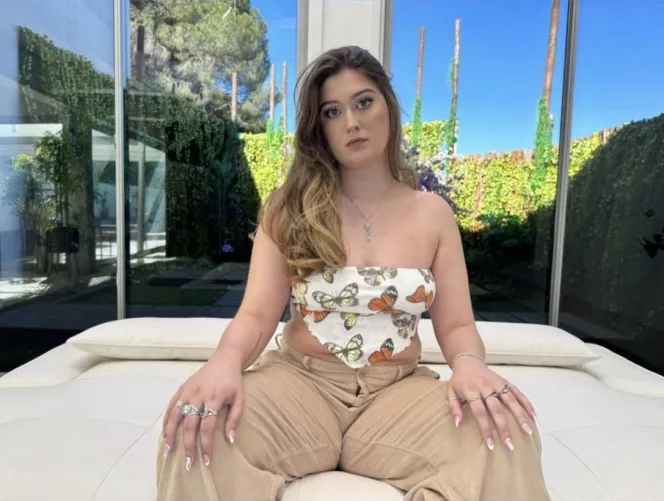 Who is she?