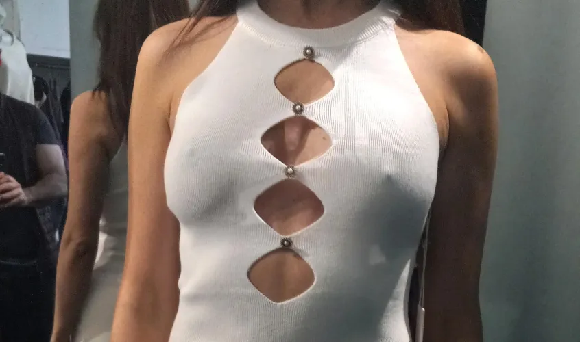 Wife Posing In Store Dressing Room While Husband Snaps Pics