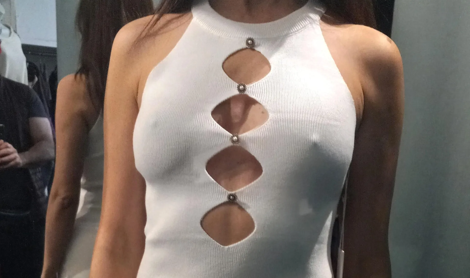 Wife Posing In Store Dressing Room While Husband Snaps Pics