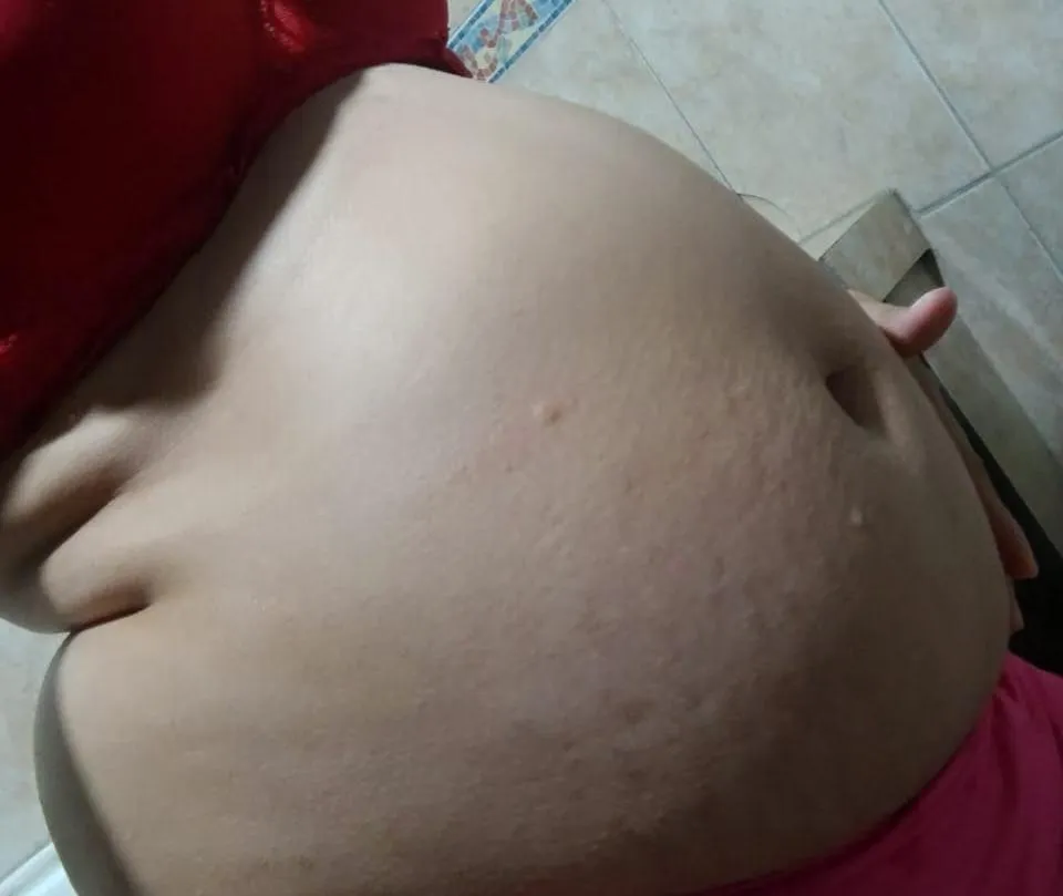 Will you help me rub my pregnant belly?