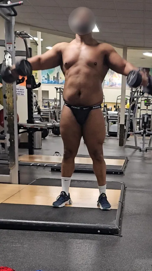 Working out in the gym. Shoulder day.