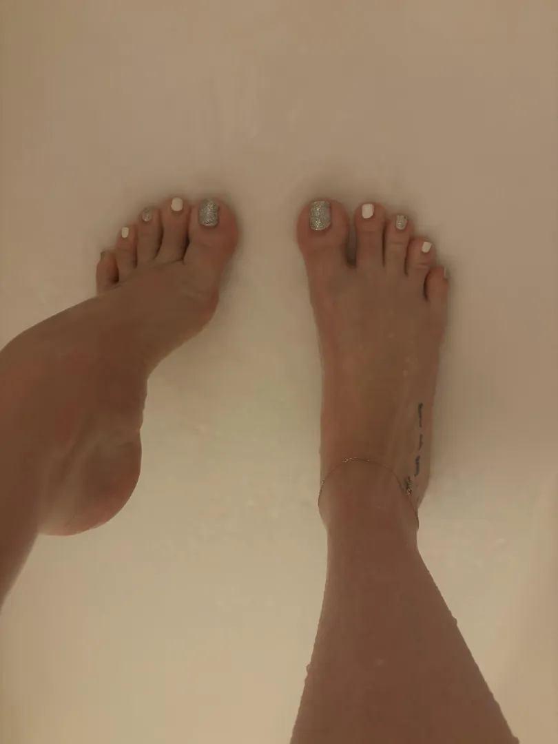 would my feet distract you from your shower?