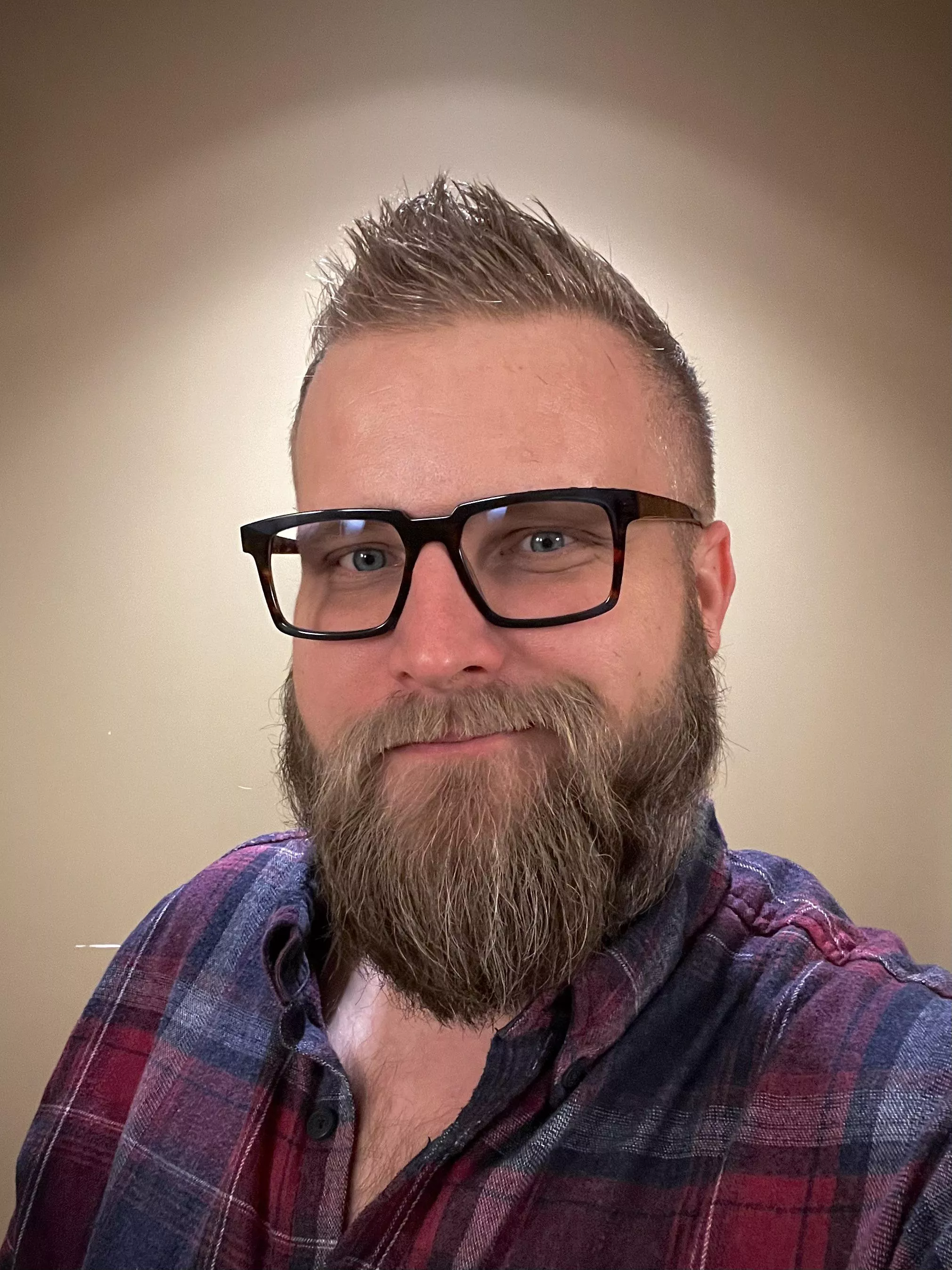 Went to a new barber 💈 on my lunch break. Got a cut and beard trim. What do you think?