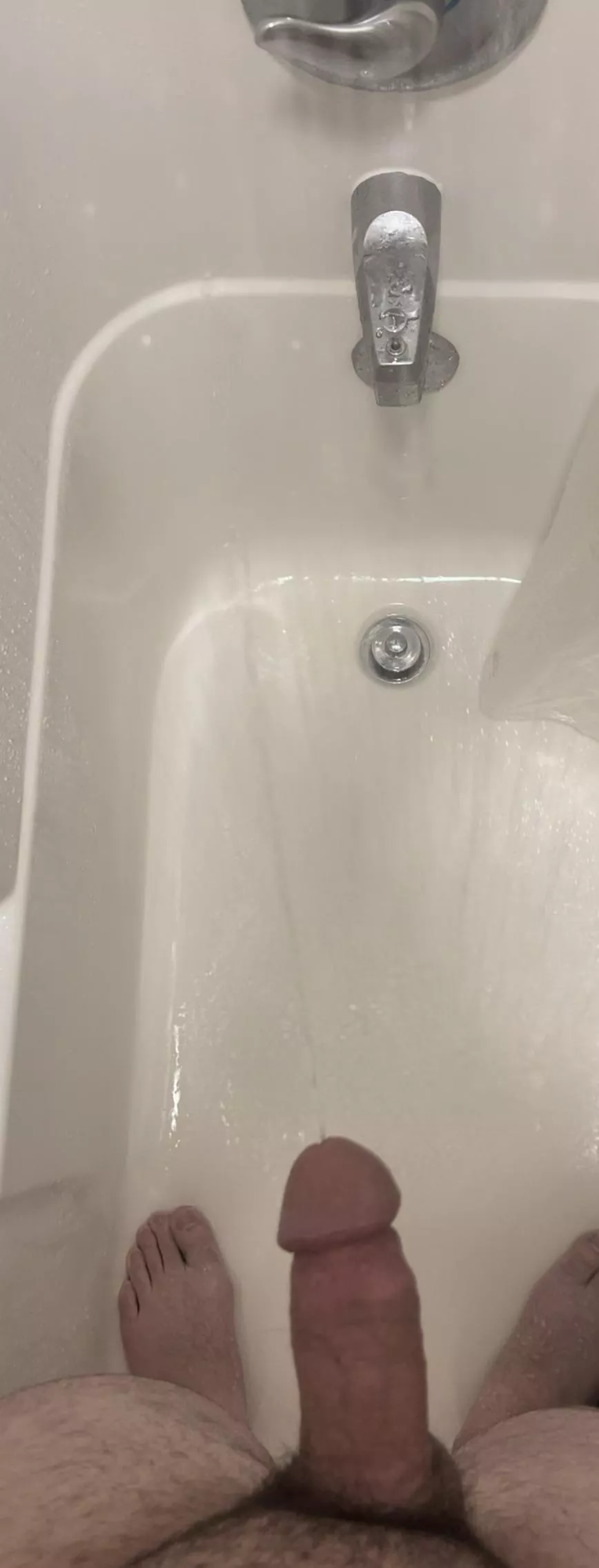 Pissing while hard with a stream so clear it looks like water