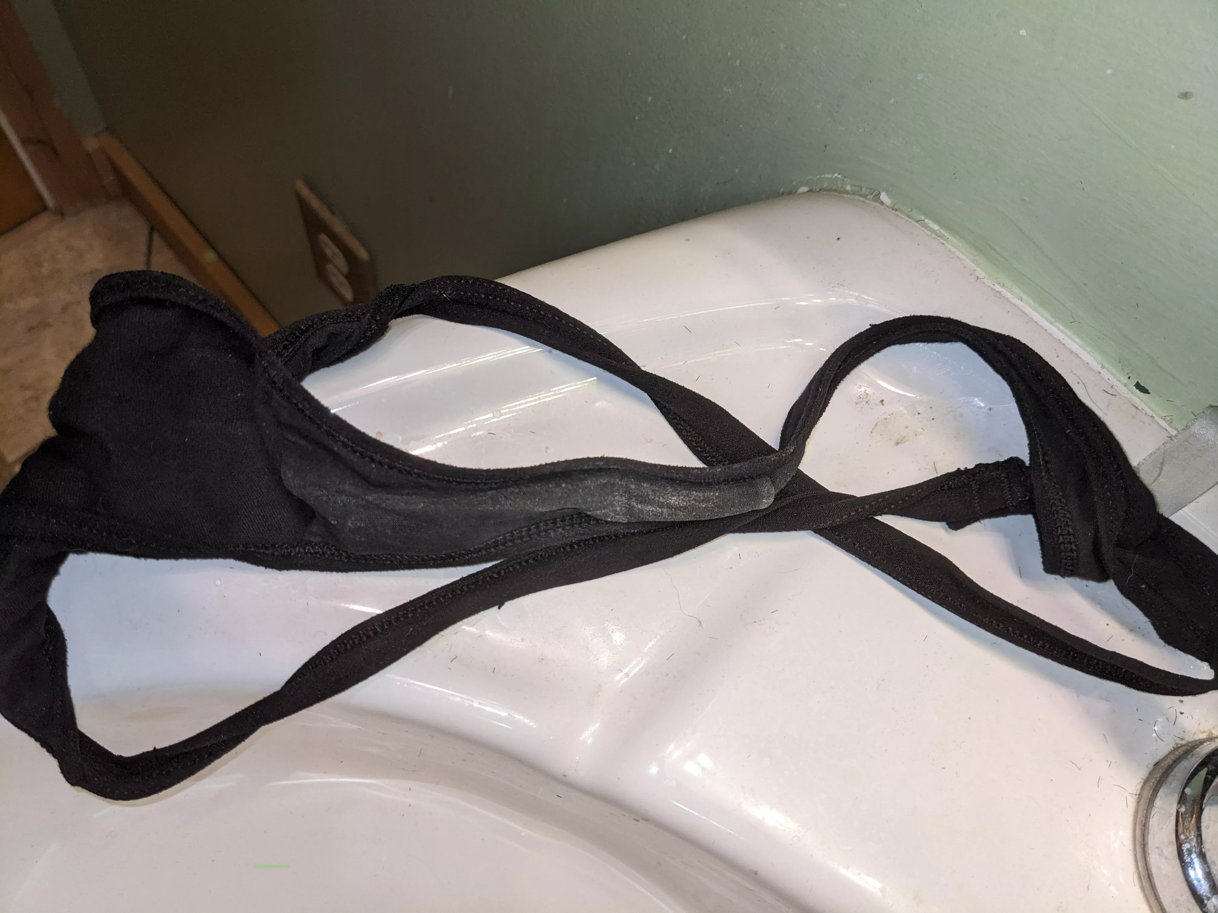 Found girlfriend black thong from last night laying on the bathroom floor after I filled her pussy and let it drip in her panties.