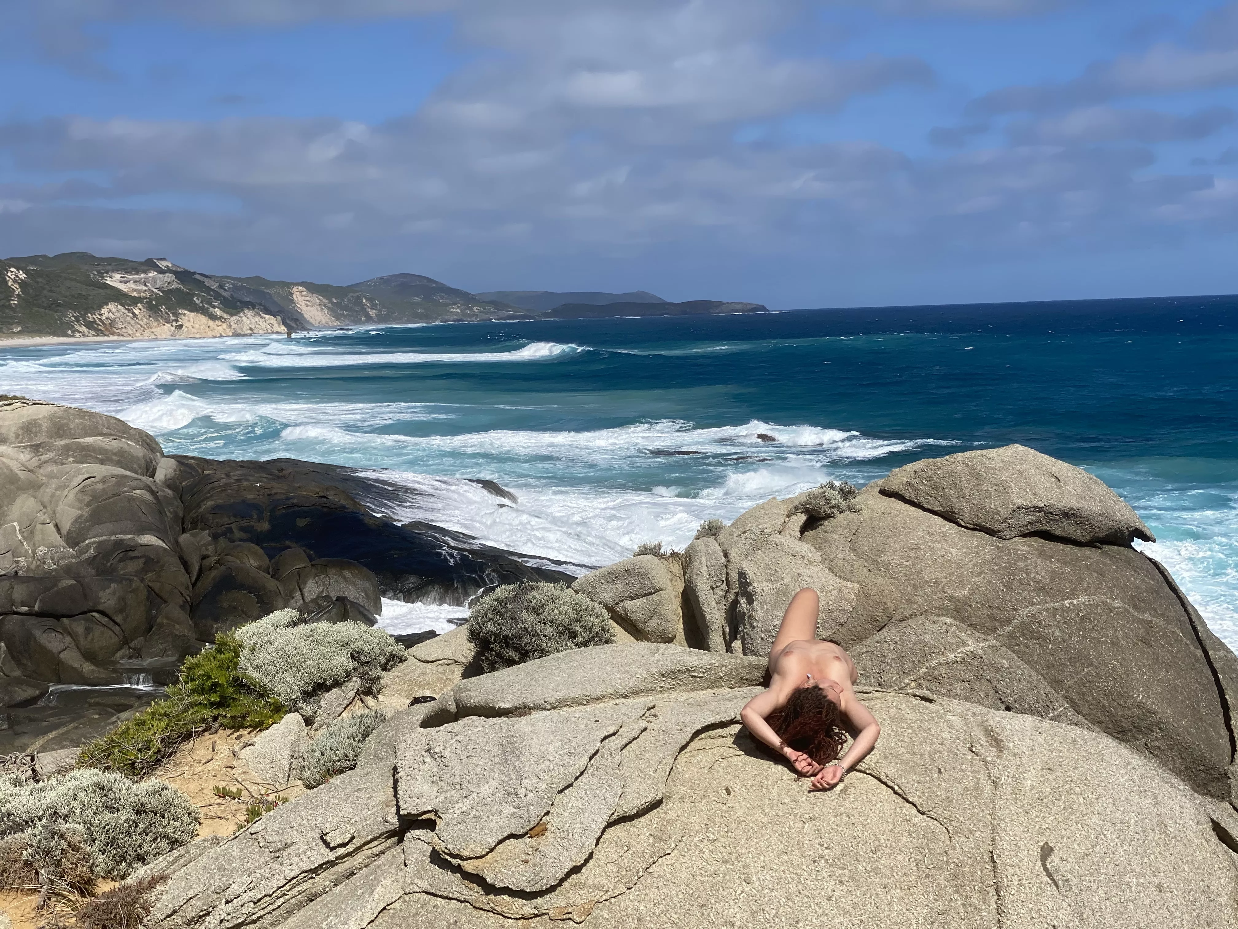 Getting sprinkled on by waves clashing into this rock at Red Point😊