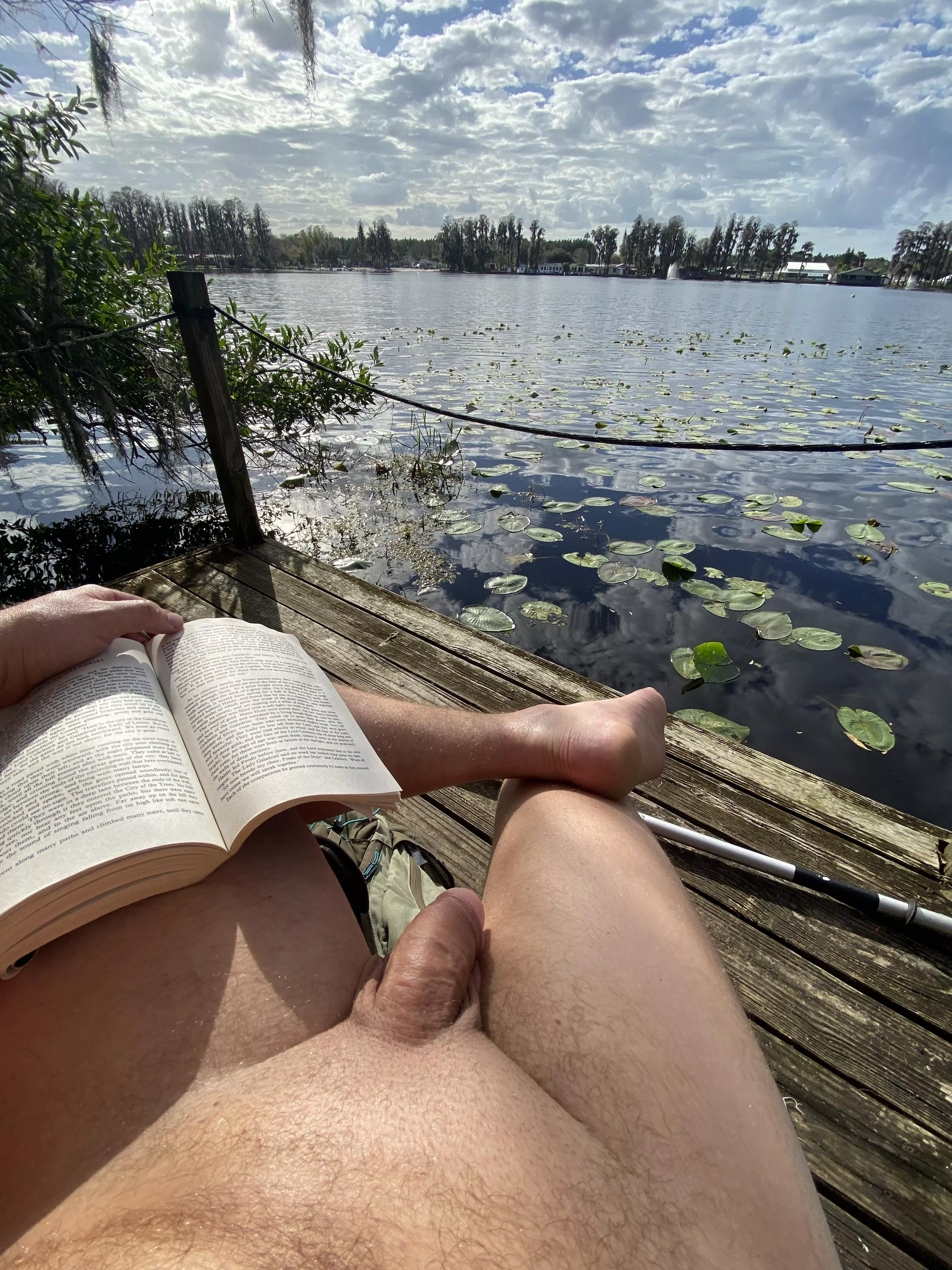 Good book and good sun, high on the water