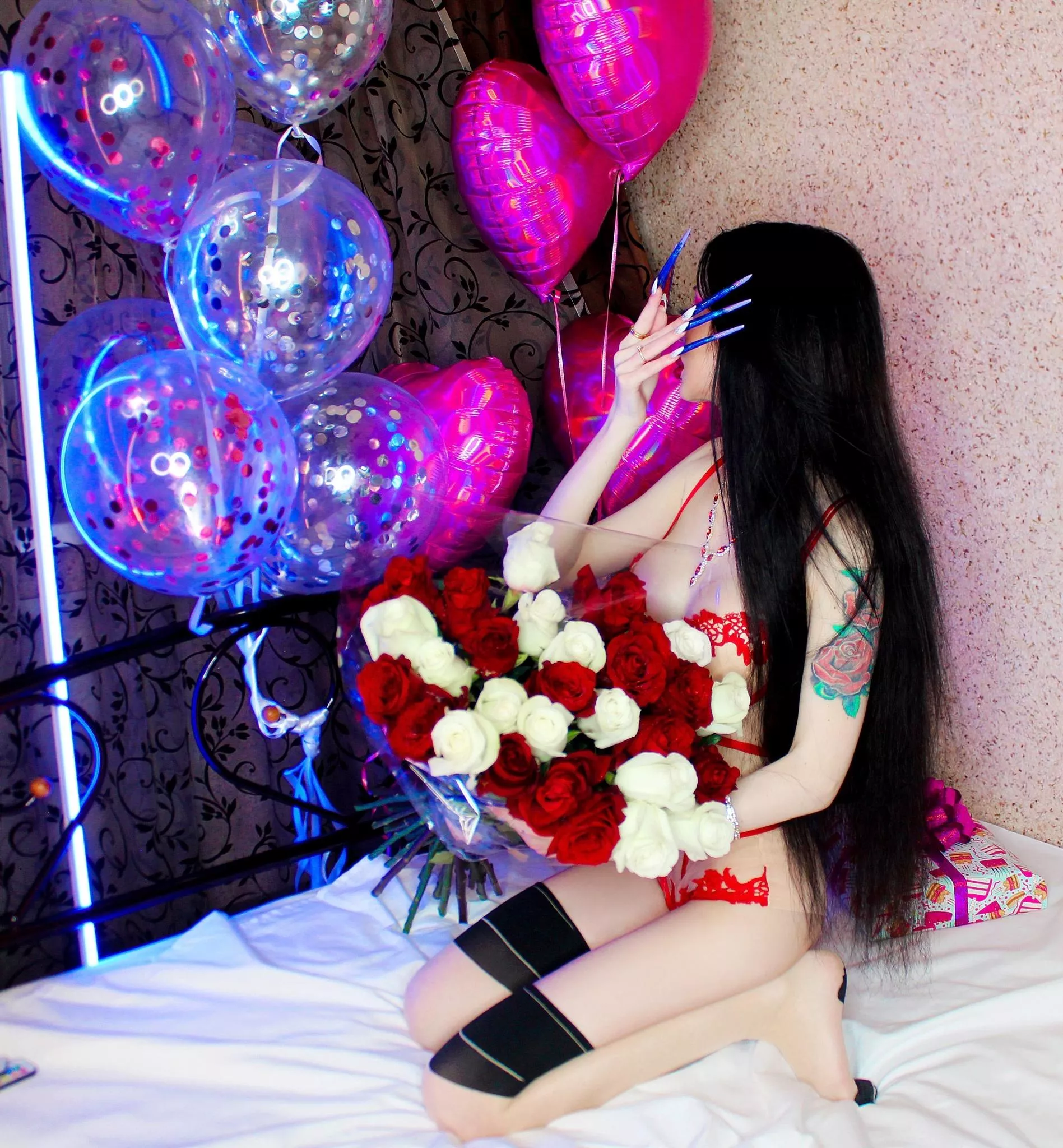 Me in red lingerie with very long nails and hair😈🔥