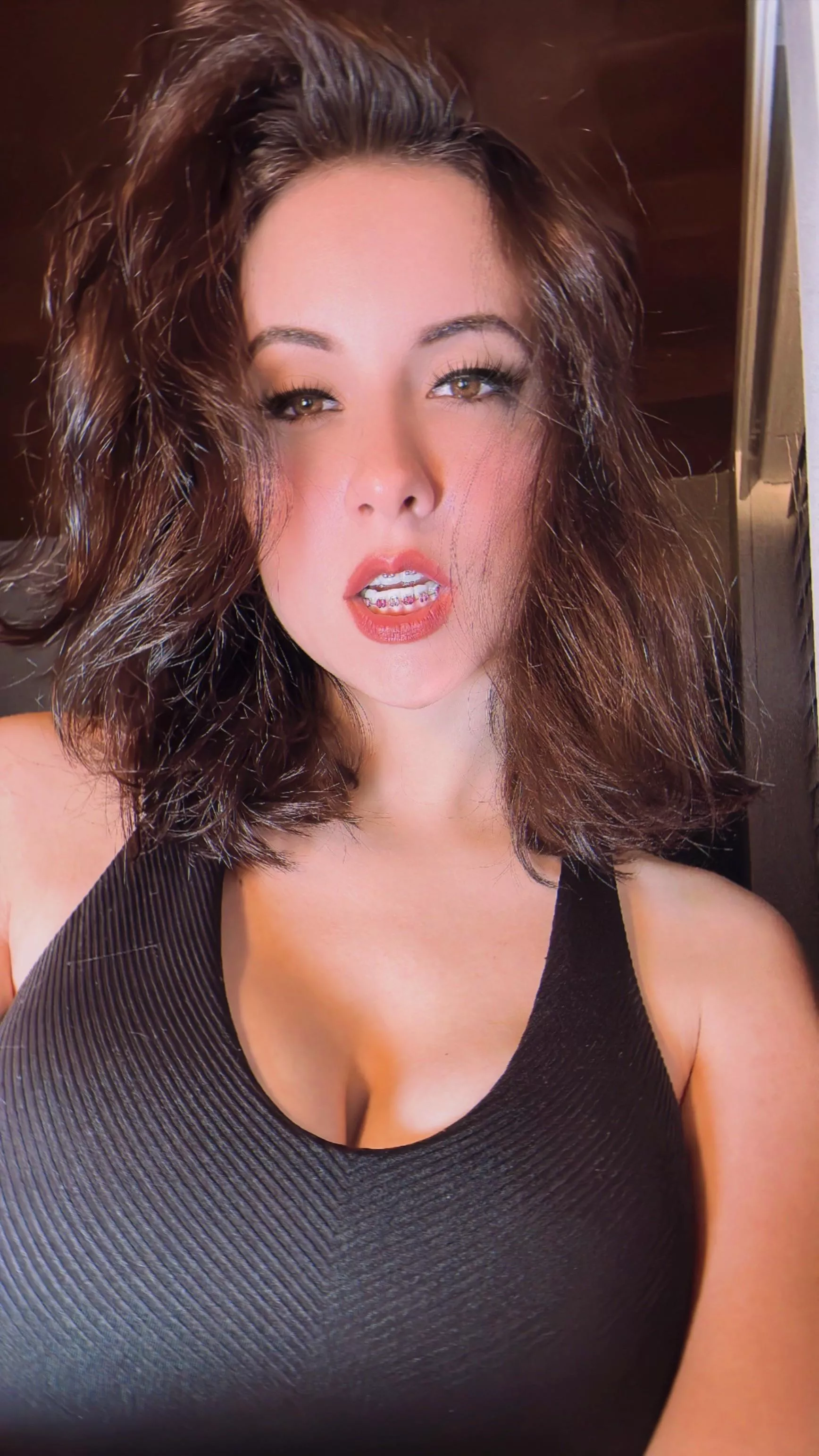 Showing off my bottom row. Do you like the alternating light and dark pink? I love choosing colors. Braces for the 2nd time.