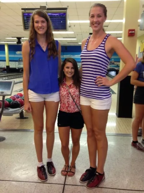 Volleyball players and a cheerleader