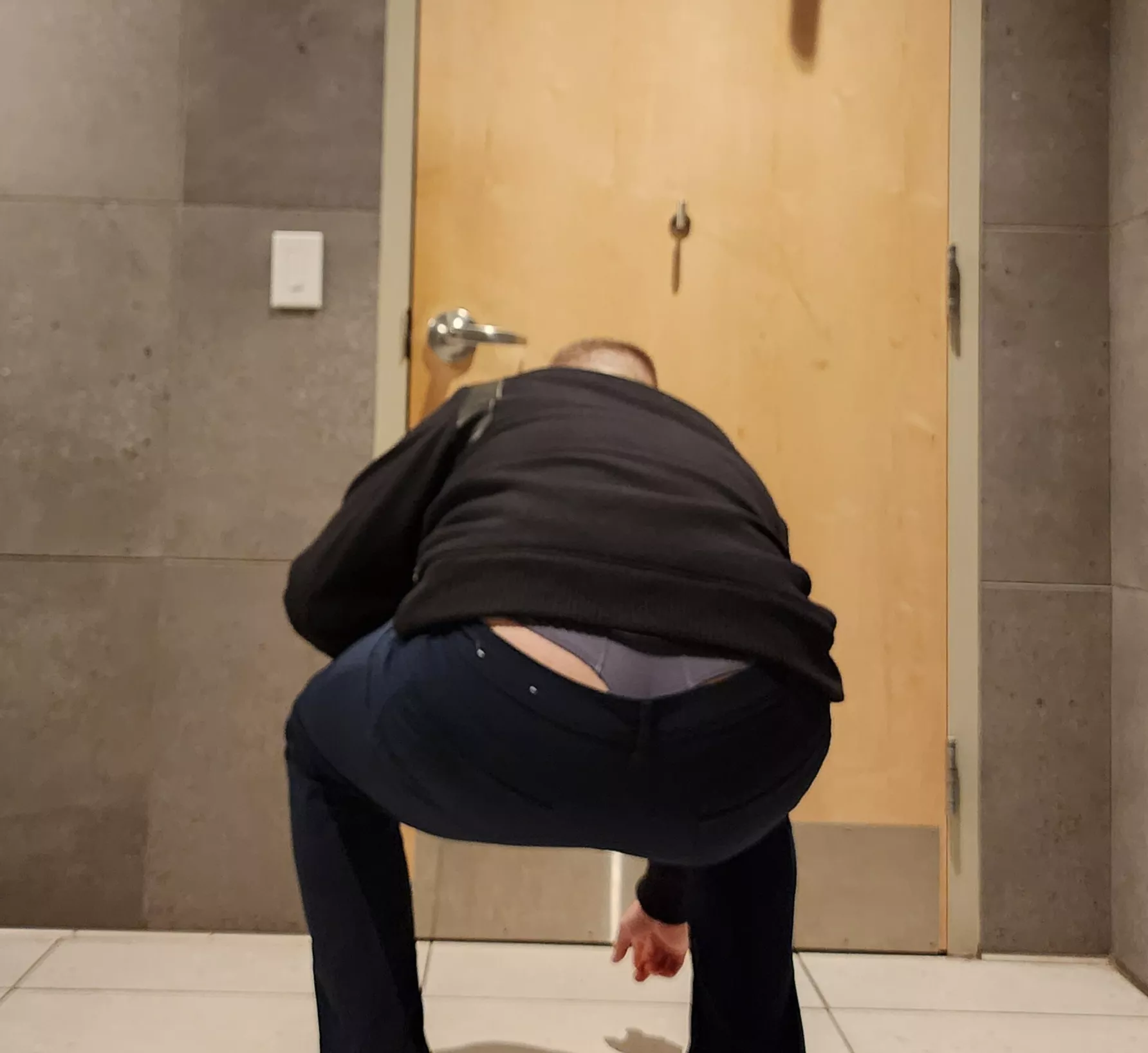 What would you do if I was picking something up off the ground in front of you?