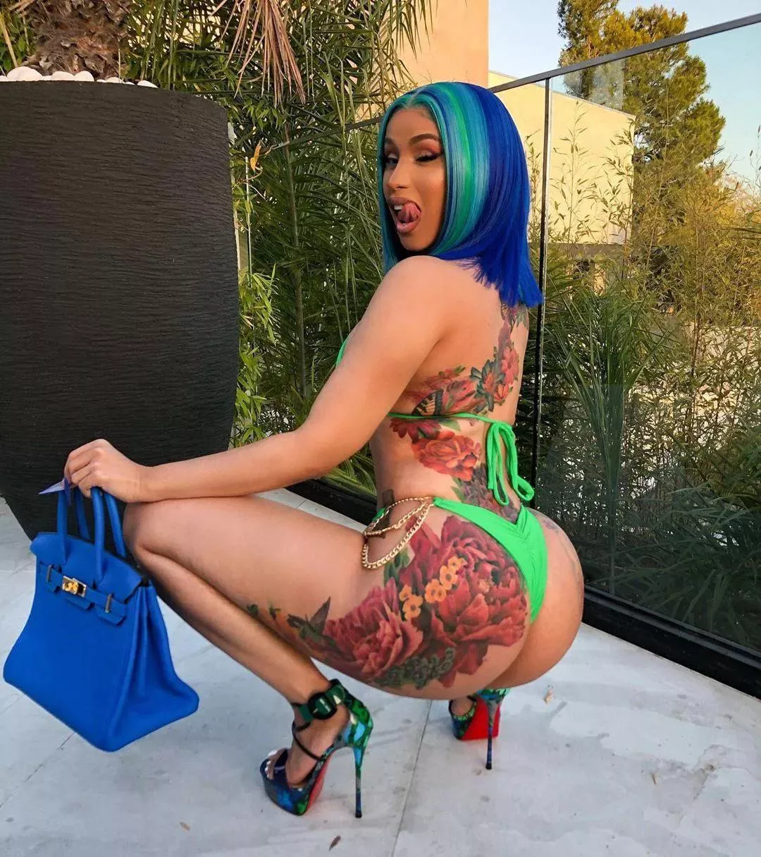 Thinking about Cardi B and her packing a massive girlcock