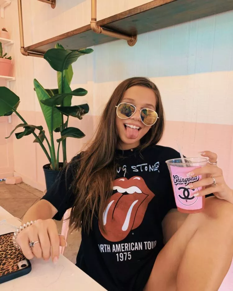 Even her shirt is playing along