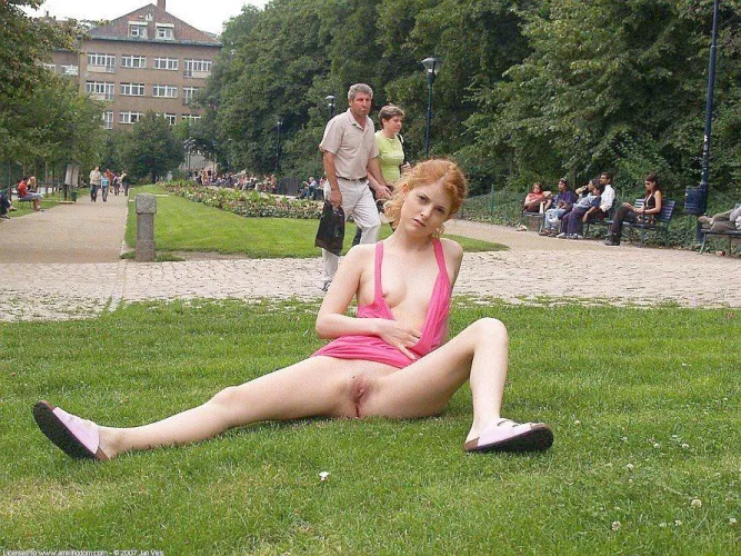 Just a redhead relaxing on the lawn