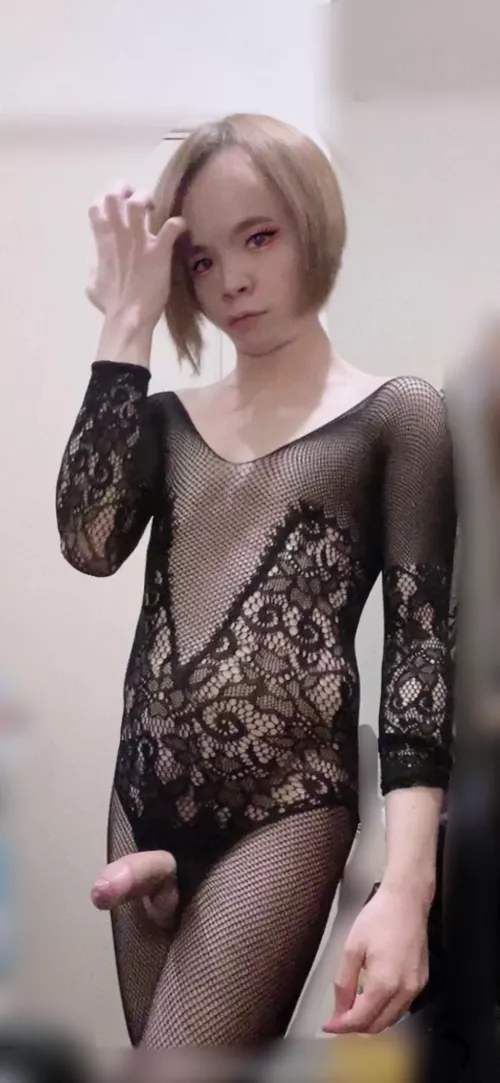 Asian sissyboy with a black bodystocking.
