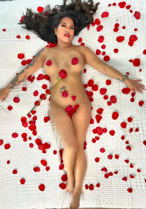 Happy Valentine’s Day, nude on a bed of roses!