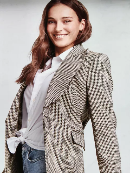 Blonde in houndstooth jacket