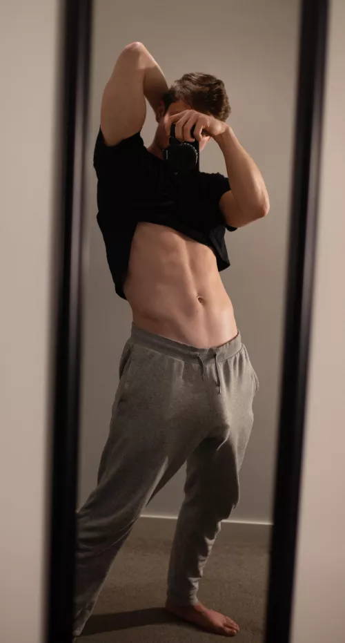 My big young cock trying to bust through my sweatpants