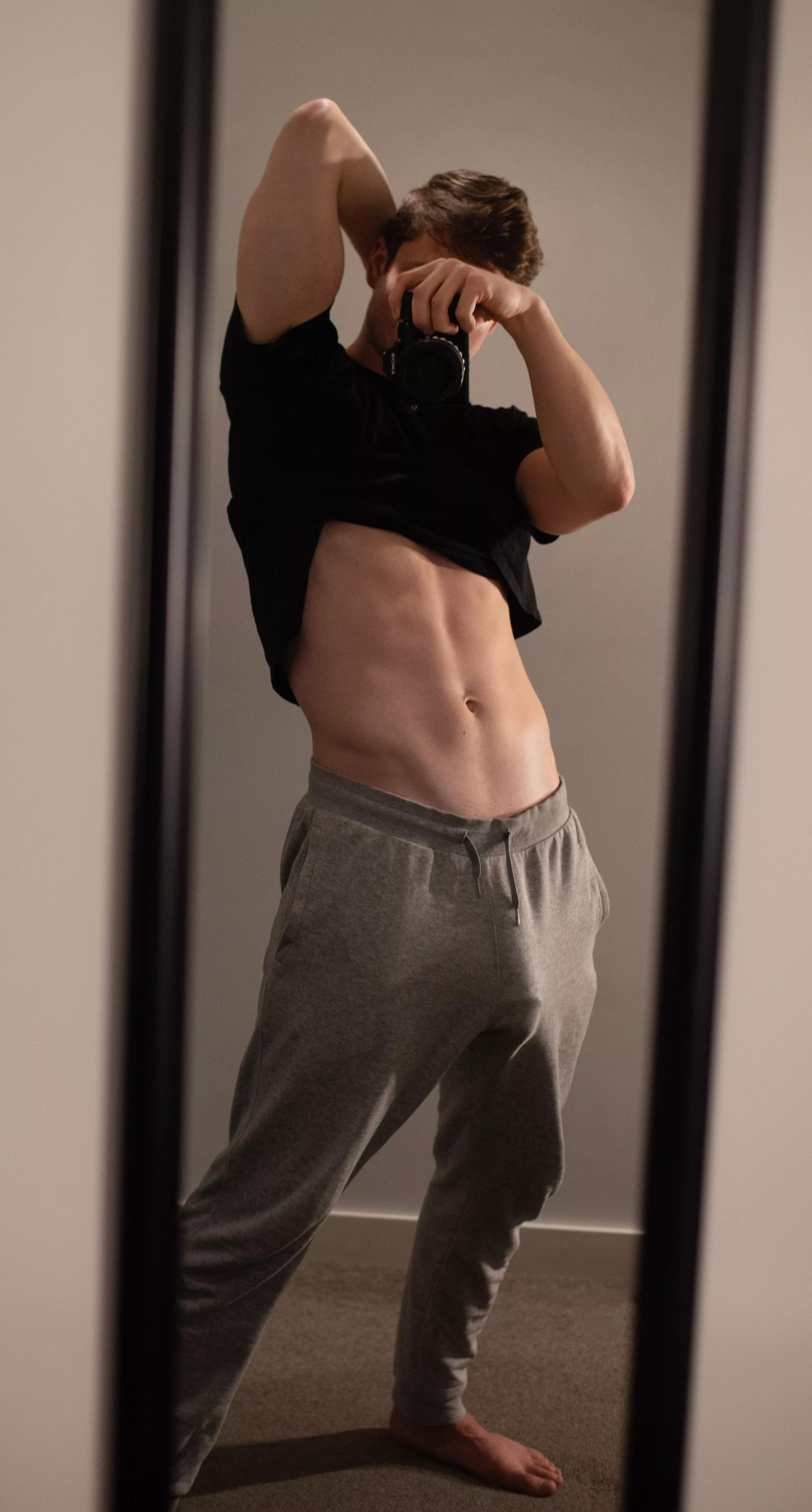 My big young cock trying to bust through my sweatpants