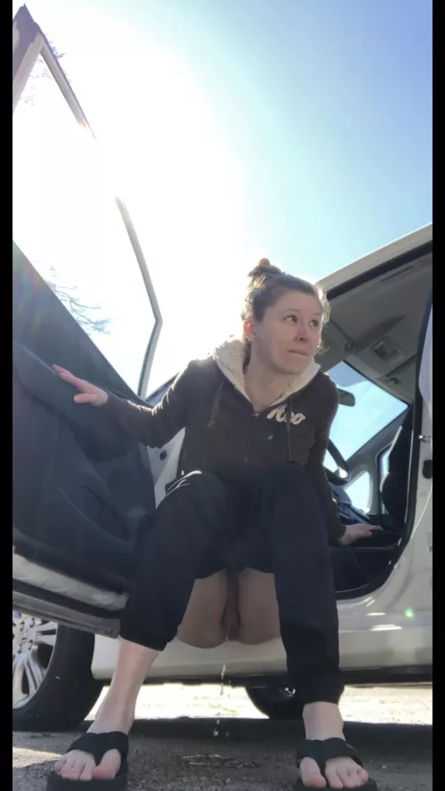 Peeing in a public parking lot 💛 hope I don’t get caught!