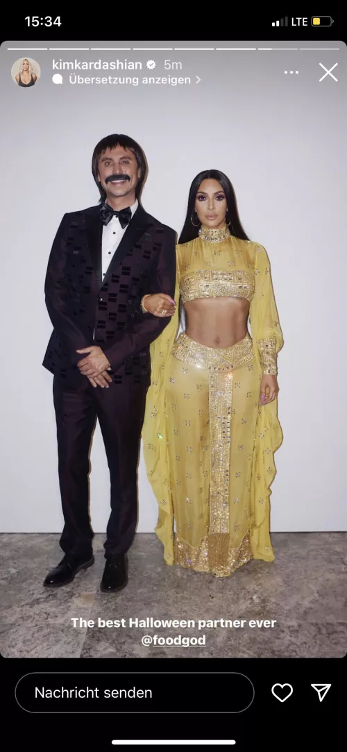 Kim with sixpack abs on Halloween