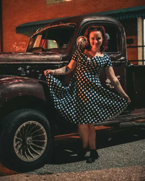 Old rusty trucks over new tuned cars